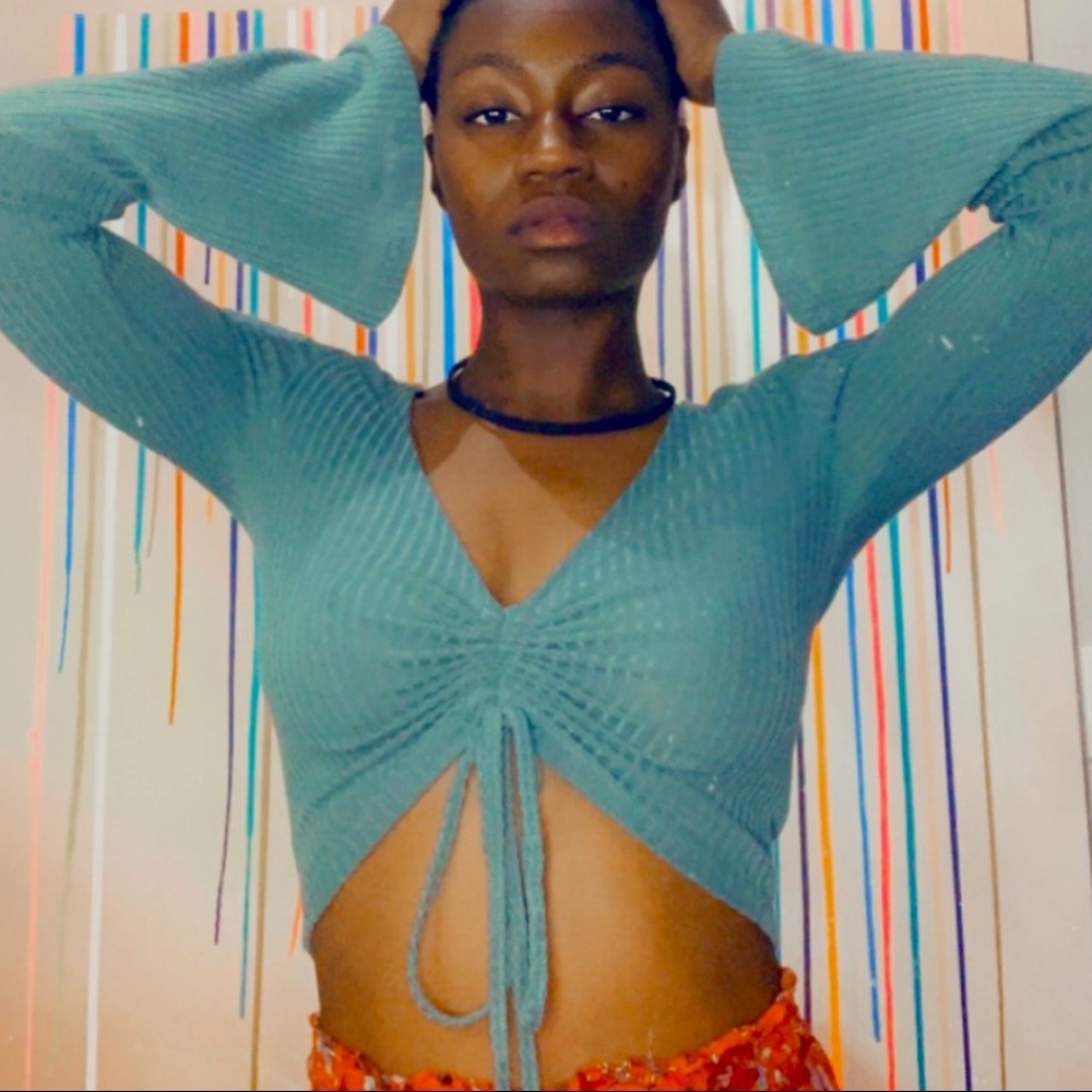 Green bell bottomed sleeved top